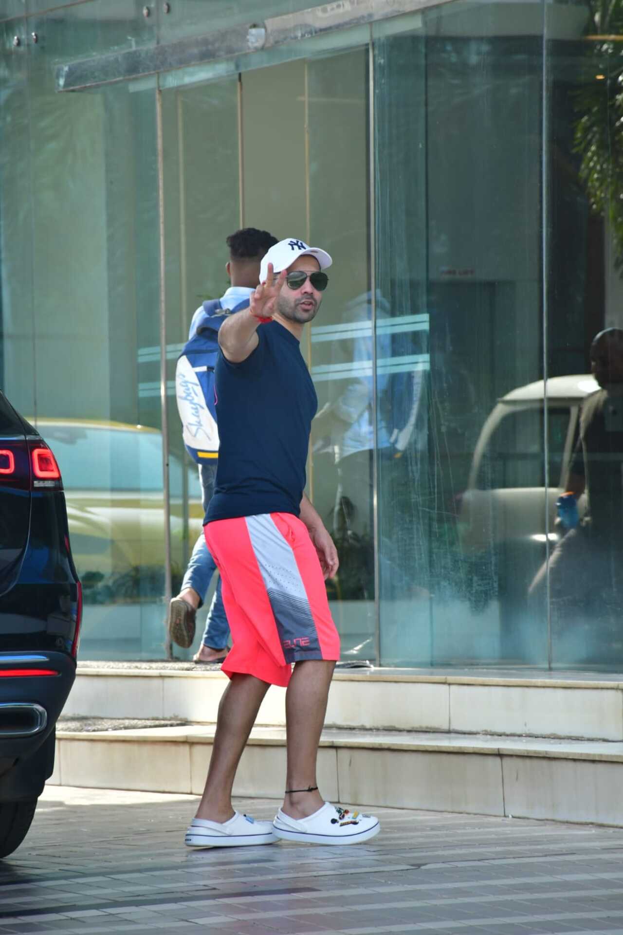 Varun was dressed in shorts and a T-shirt